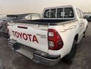 Toyota Hilux 2.7L - Super White Inside Red