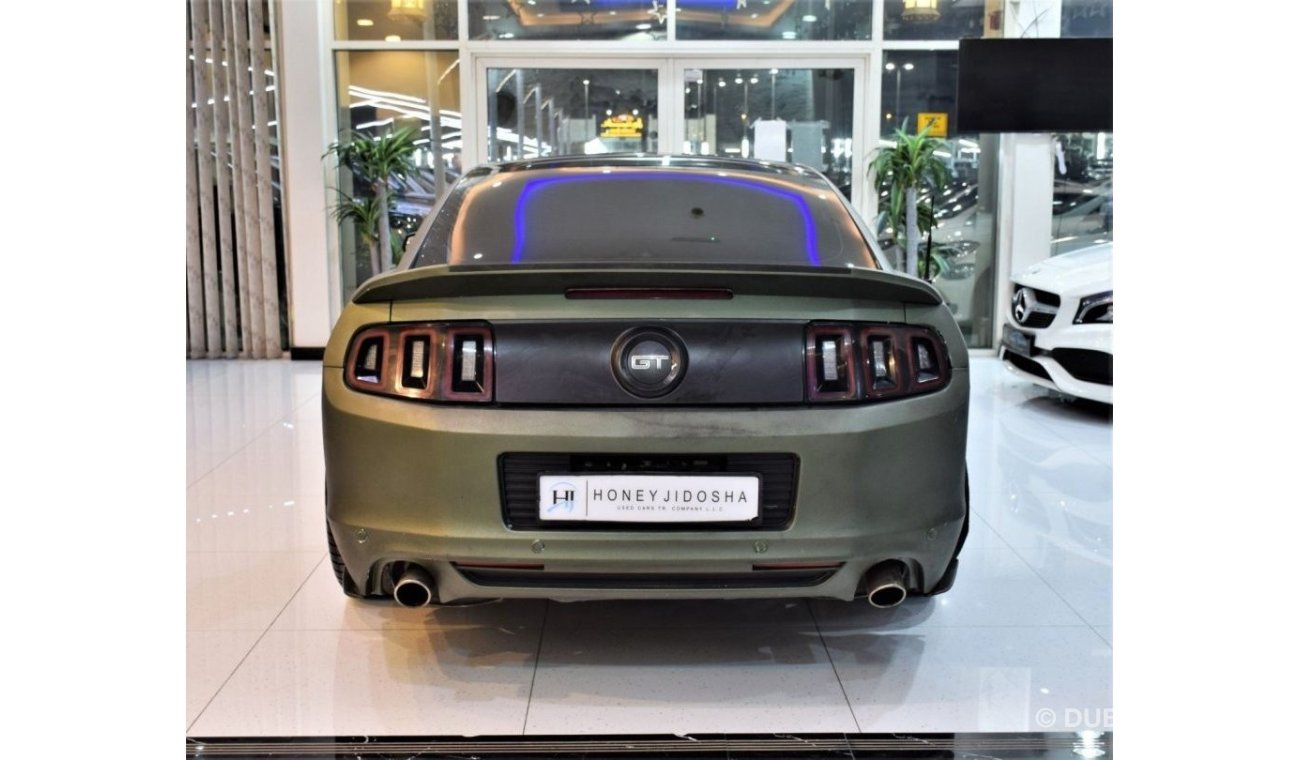 Ford Mustang EXCELLENT DEAL for our Ford Mustang 5.0 GT 2013 Model!! in Crinkled Green Color! GCC Specs