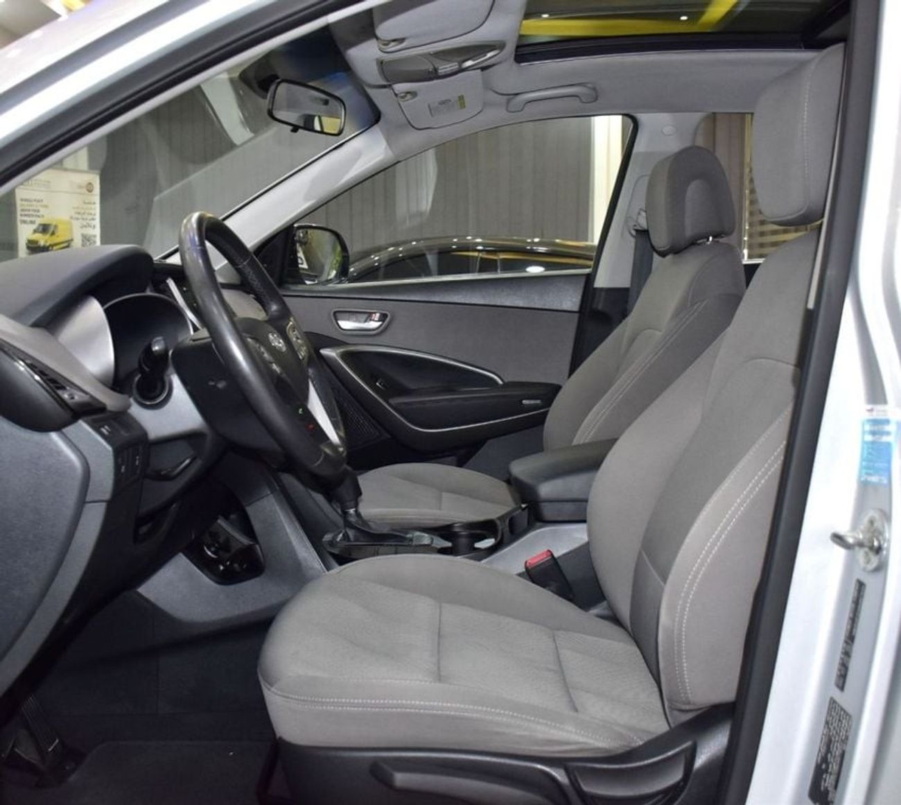 Hyundai Santa Fe EXCELLENT DEAL for our Hyundai SantaFe 4WD V6 ( 2016 Model ) in Silver Color GCC Specs