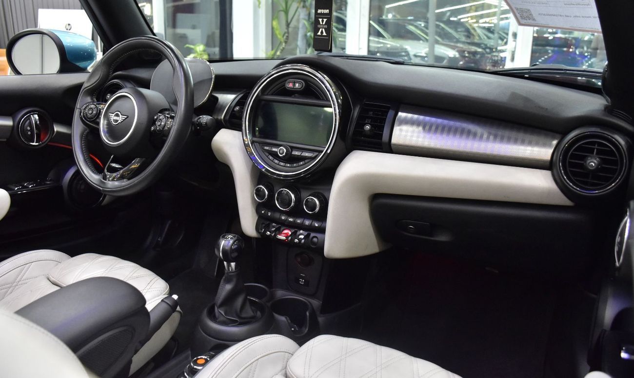 Mini Cooper Cabrio EXCELLENT DEAL for our Mini Cooper Cabrio ( 2021 Model ) in Blue Color American Specs