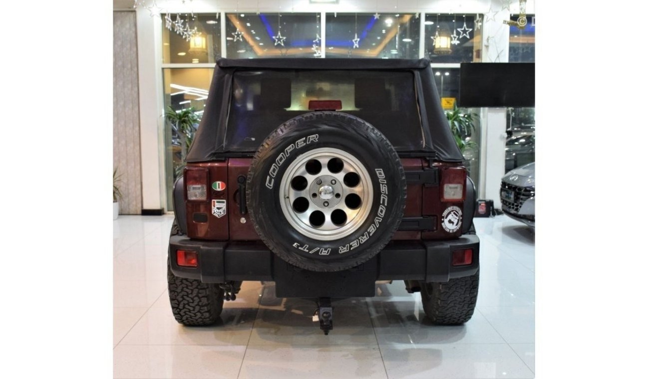 Jeep Wrangler EXCELLENT DEAL for our Jeep Wrangler Sport ( 2009 Model! ) in Red Color! GCC Specs