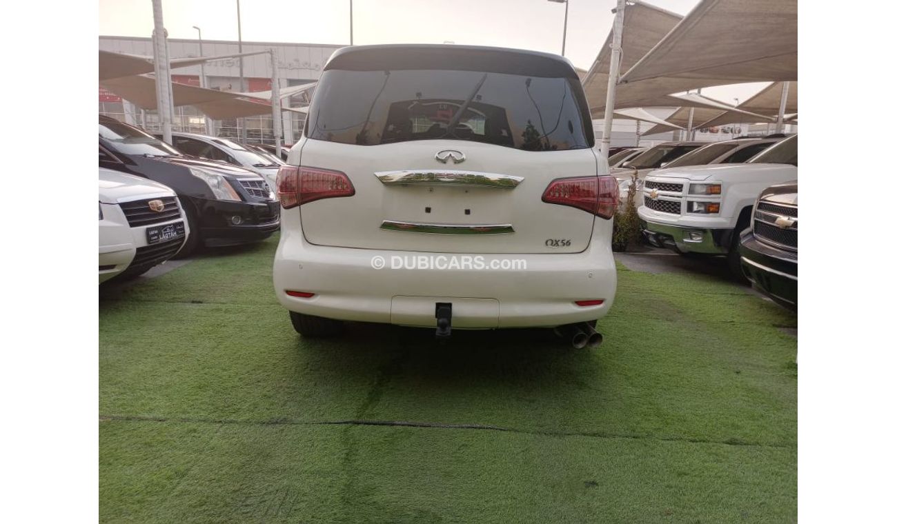 Infiniti QX56 Model 2011 imported, white color, leather opening, alloy wheels, sensors, speed stabilizer, in excel