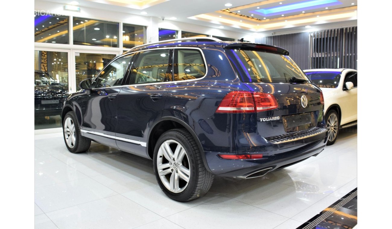 Volkswagen Touareg SEL EXCELLENT DEAL for our Volkswagen Touareg ( 2015 Model! ) in Blue Color! GCC Specs