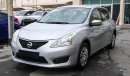 Nissan Tiida Pre-owned  for sale in Sharjah. Grey/Silver 2016 model, available at Wael Al Azzazi Shar