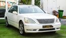 Lexus LS430 Imported 1/2 Ultra 2006 model, white color, leather opening, wooden wheels, electric mirrors, electr