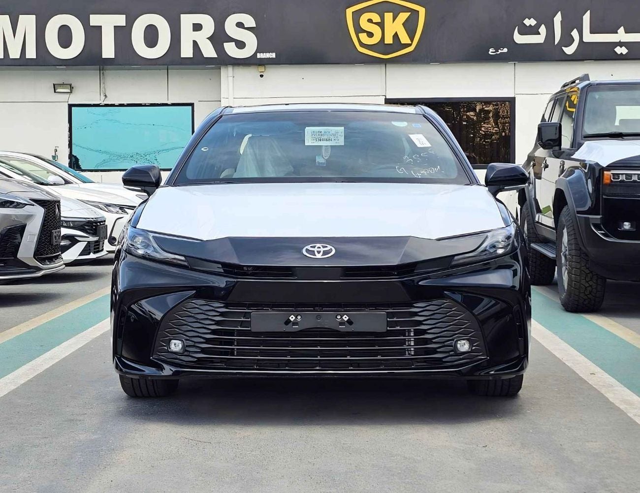 تويوتا كامري E-PLUS HYBRID / 2.5L V4 PETROL / SUNROOF / FABRIC SEATS WITH DRIVER PWR SEAT (CODE # CPEA)