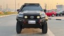 تويوتا هيلوكس OFF-ROAD MODIFIED | SPORTS BAR - ROOF RACK - BULL BAR | MT | 2.8L DIESEL ENGINE | RHD