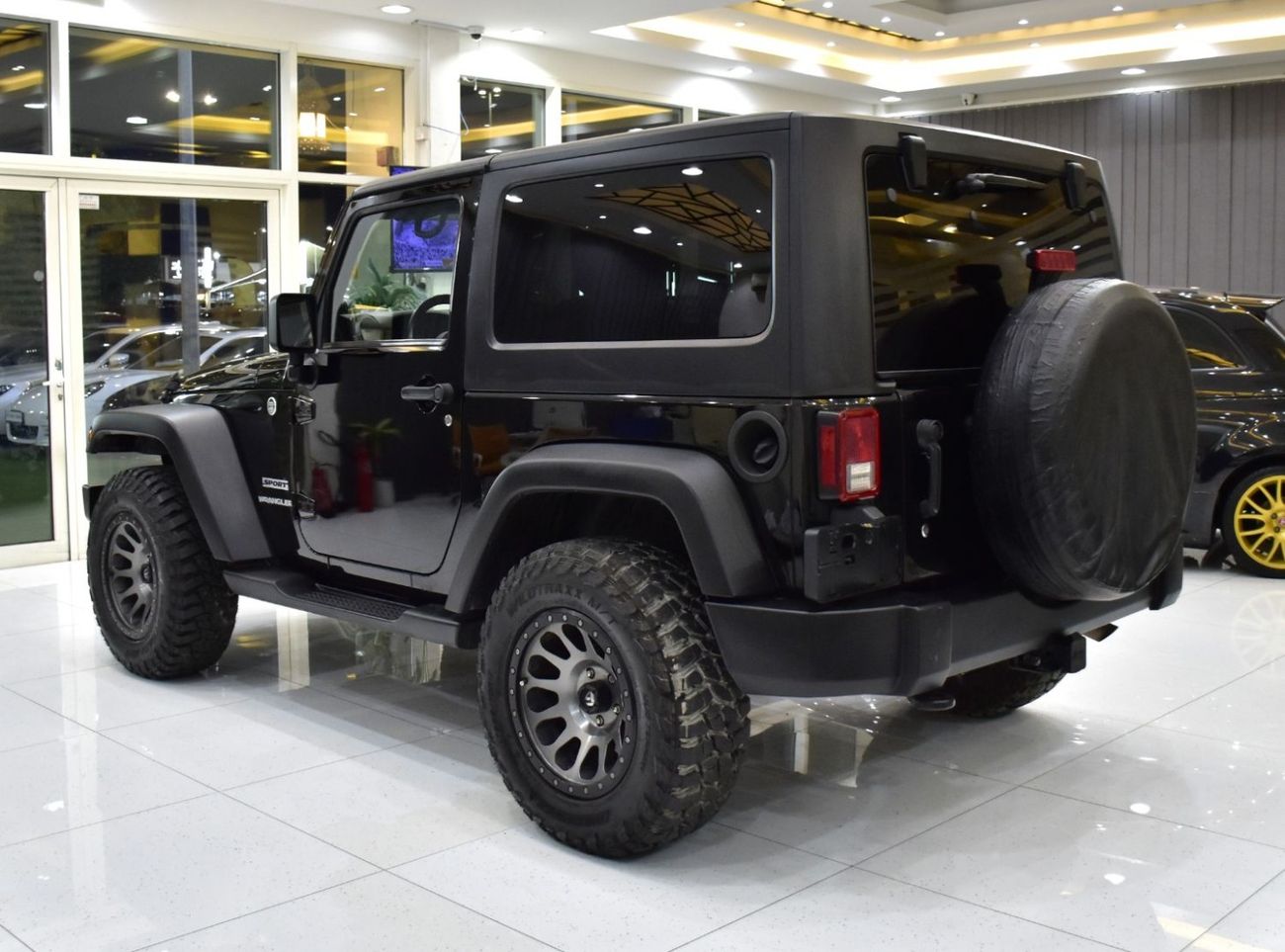 Jeep Wrangler EXCELLENT DEAL for our Jeep Wrangler Sport ( 2012 Model ) in Black Color American Specs