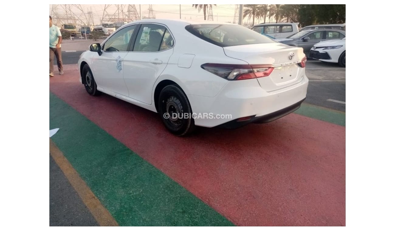 Toyota Camry LE 2022  White inside beige 2.5L petrol 4 Cylinder
