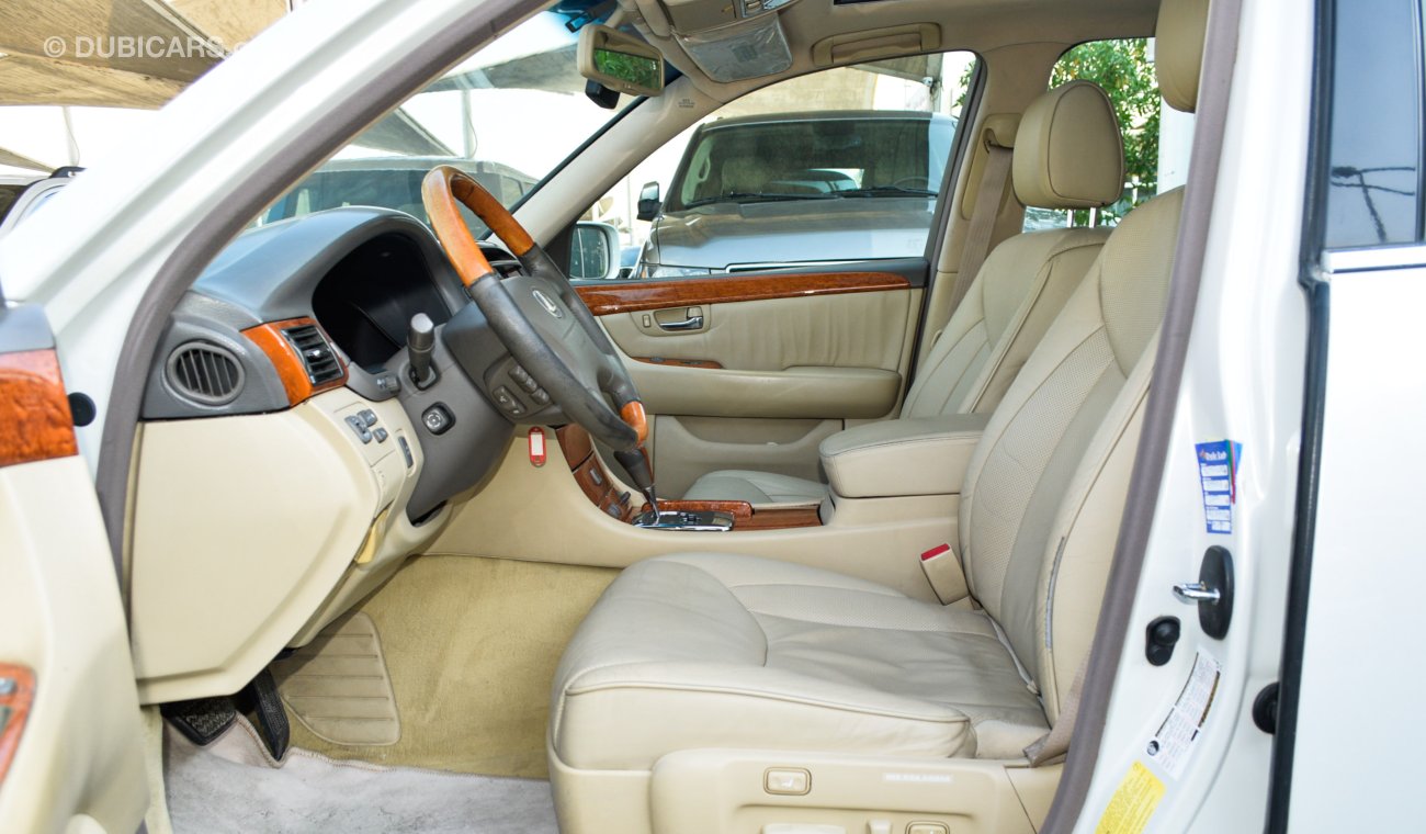 Lexus LS 430 Imported 1/2 Ultra 2006 model, white color, leather opening, wooden wheels, electric mirrors, electr