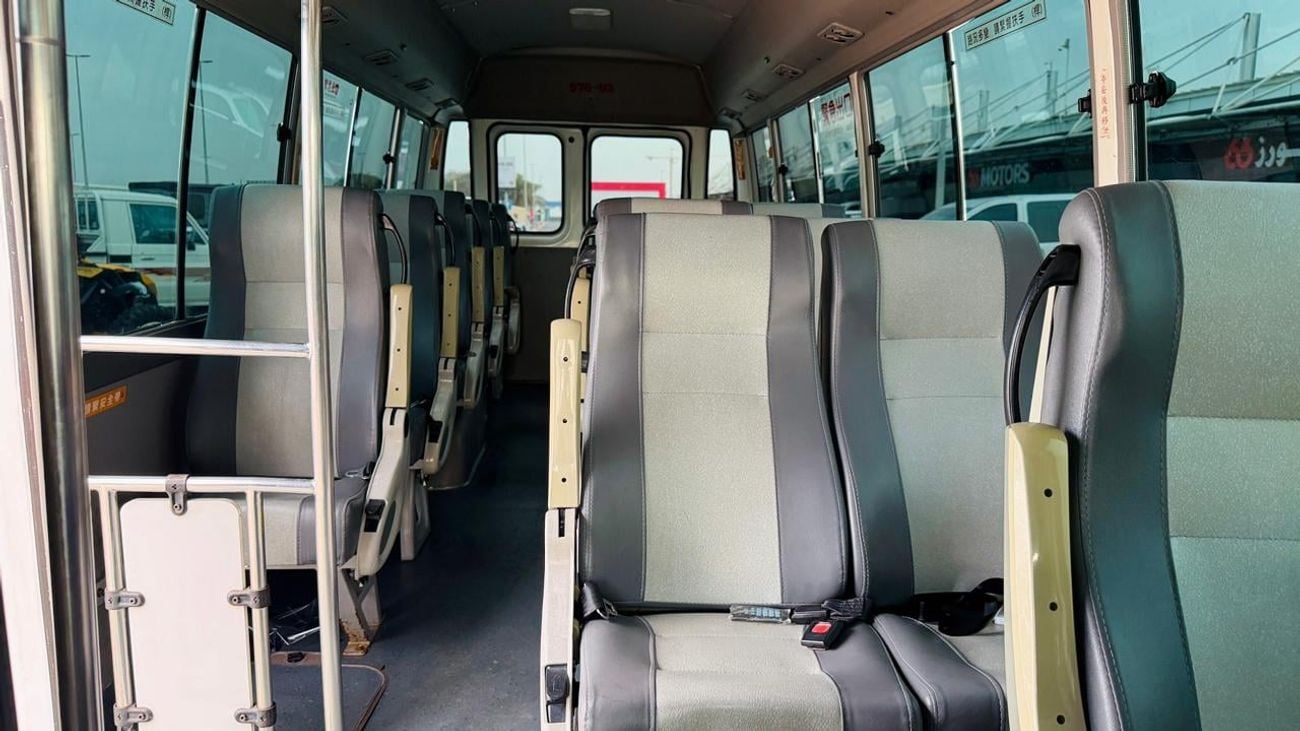 Toyota Coaster Fully luxury seats fully covered by cameras