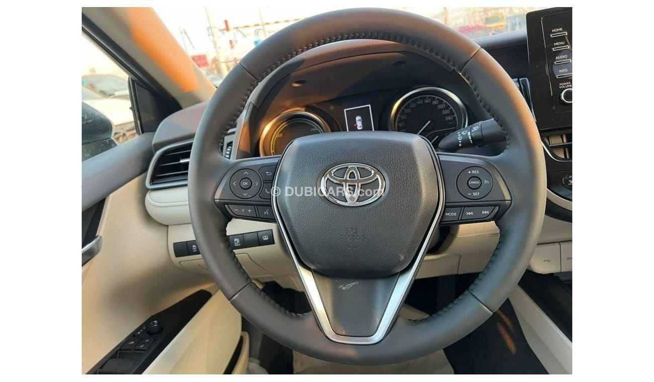 Toyota Camry 2023 GLE (( Hybrid )) White color , 2.5L 4cyl Petrol, A/T, FWD