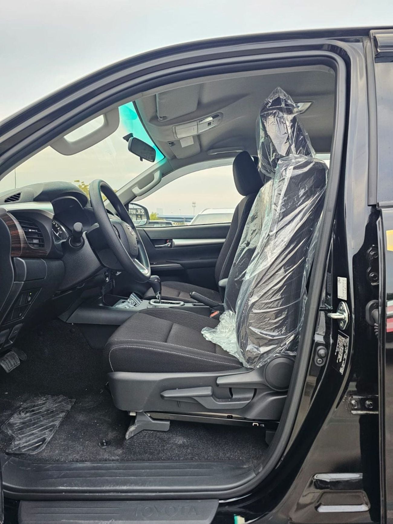 Toyota Hilux TOYOTA HILUX SR5 WIDE BODY DOUBLE CABIN || 2.7L PETROL A/T 4WD | BSM, WINOW VISOR, FOG LIGHTS, WOOD