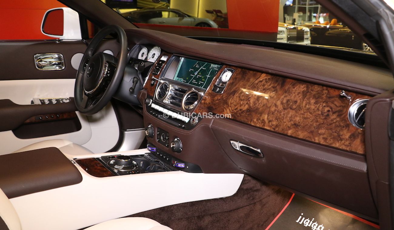 Rolls-Royce Wraith Original Color:  Brown | Silver  ( car with White Vinyl Sticker )