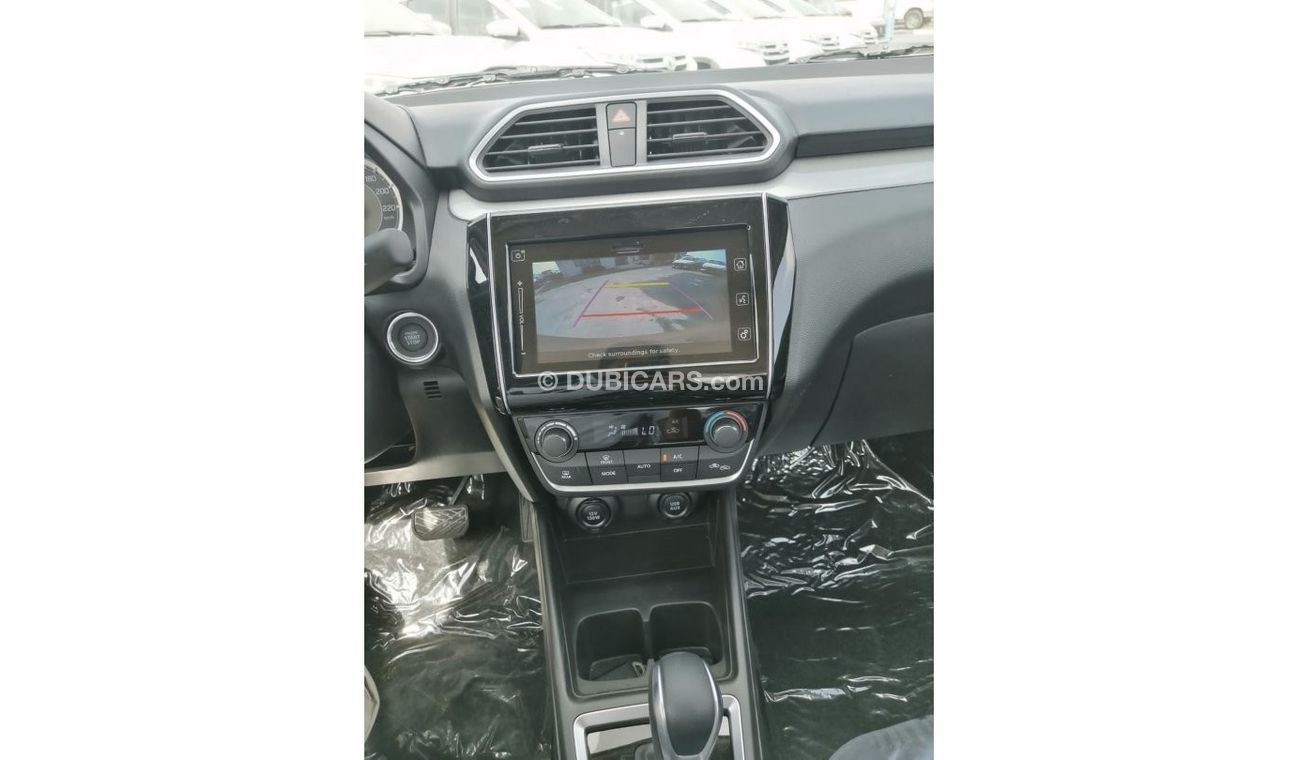 Suzuki Dzire GLS ,1.2 L ,  push start , rims , screen with android system , rear camera