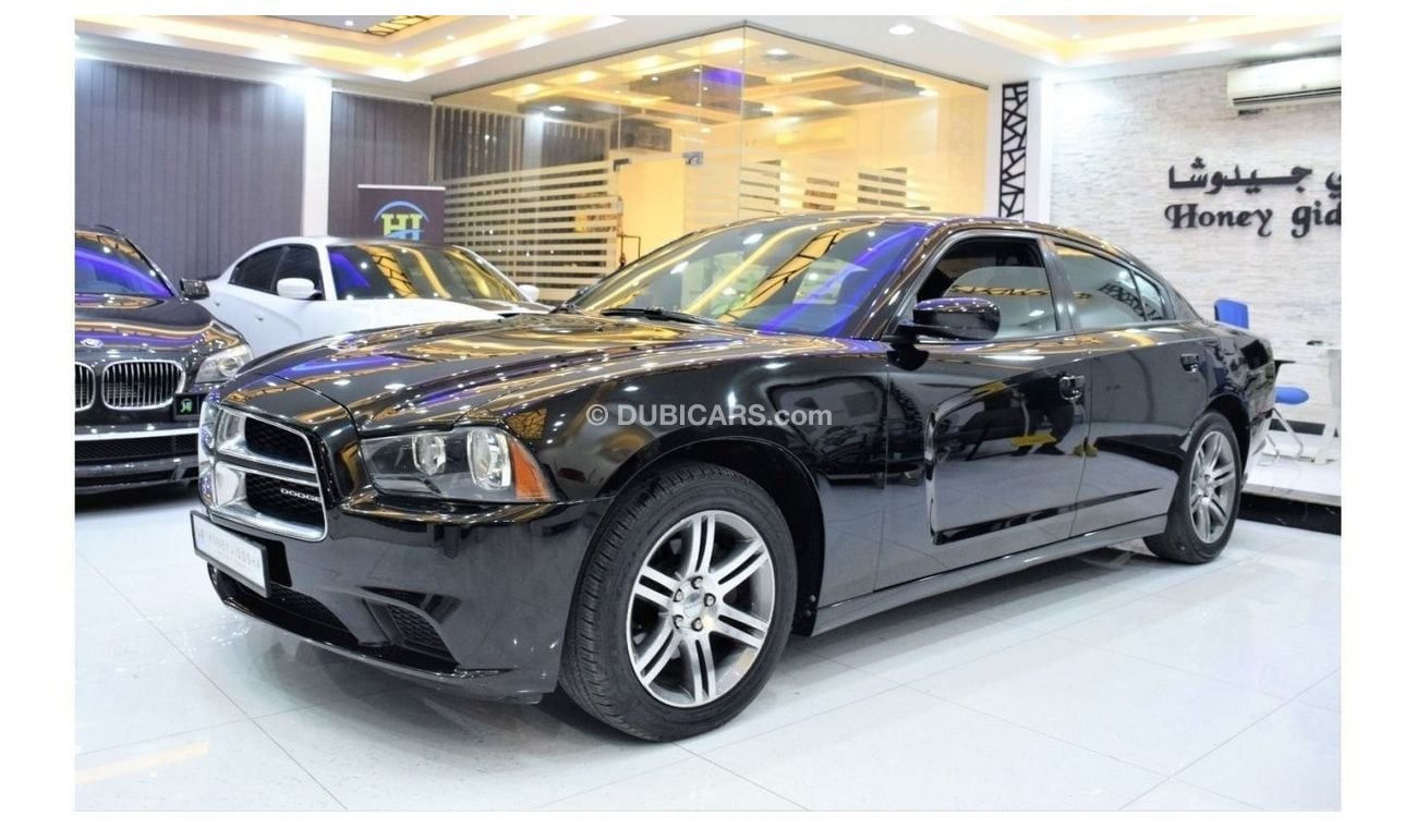 Dodge Charger EXCELLENT DEAL for our Dodge Charger ( 2014 Model ) in Black Color GCC Specs