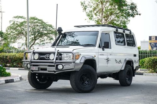 تويوتا لاند كروزر 70 The 2013 Toyota Land Cruiser Hardtop is a rugged, off-road focused SUV from the legendary 70 Series