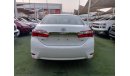 Toyota Corolla 1600 CC model 2016 GCC white color inside beige control unit in excellent condition
