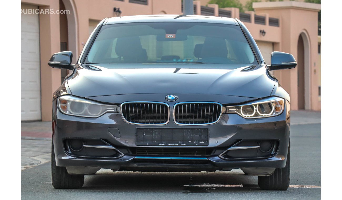 BMW 316i i 2013 GCC under Warranty with Zero downpayment.