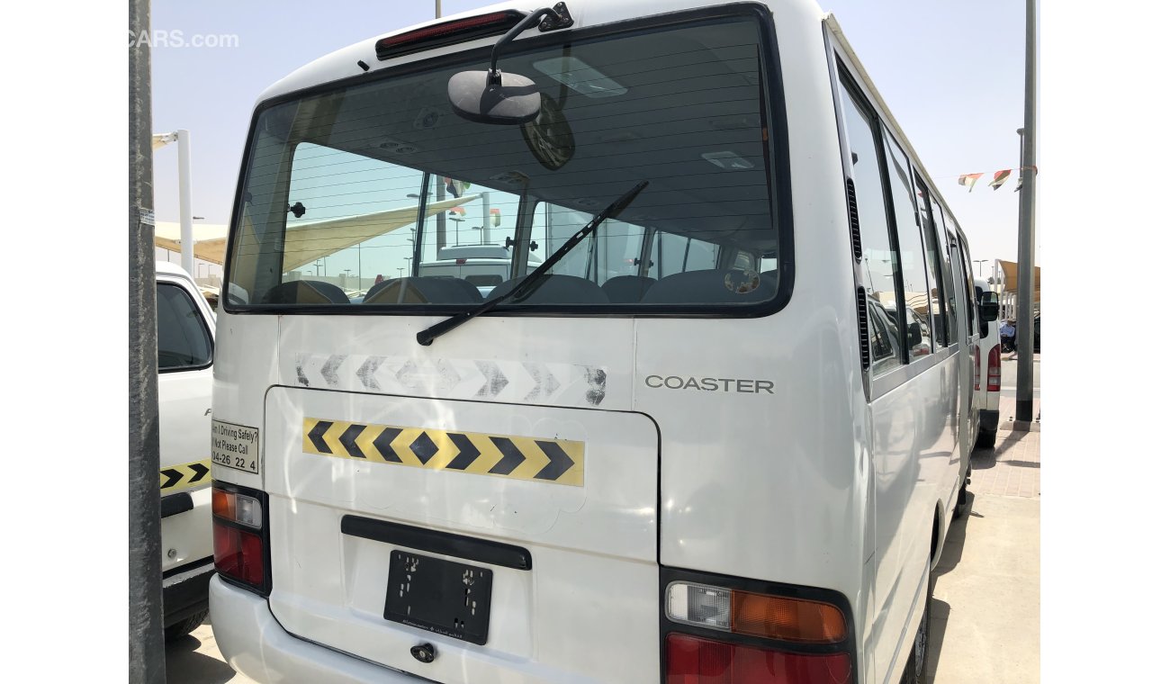 Toyota Coaster Toyota Coaster 26 str bus, Model:1999. Free of accident with low mileage