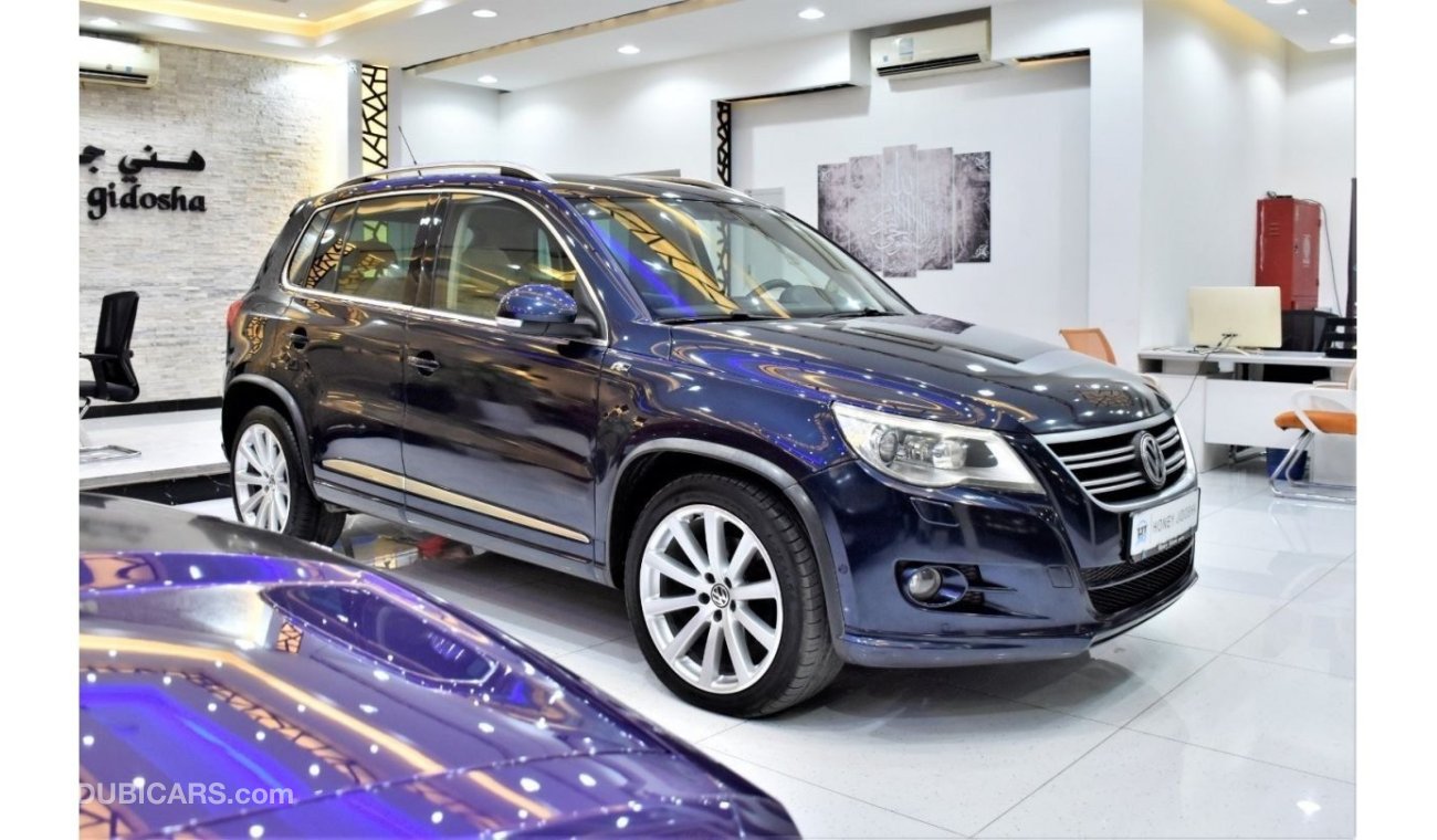 Volkswagen Tiguan EXCELLENT DEAL for our Volkswagen Tiguan R-Line 2.0TSi 4Motion ( 2011 Model ) in Blue Color GCC Spec