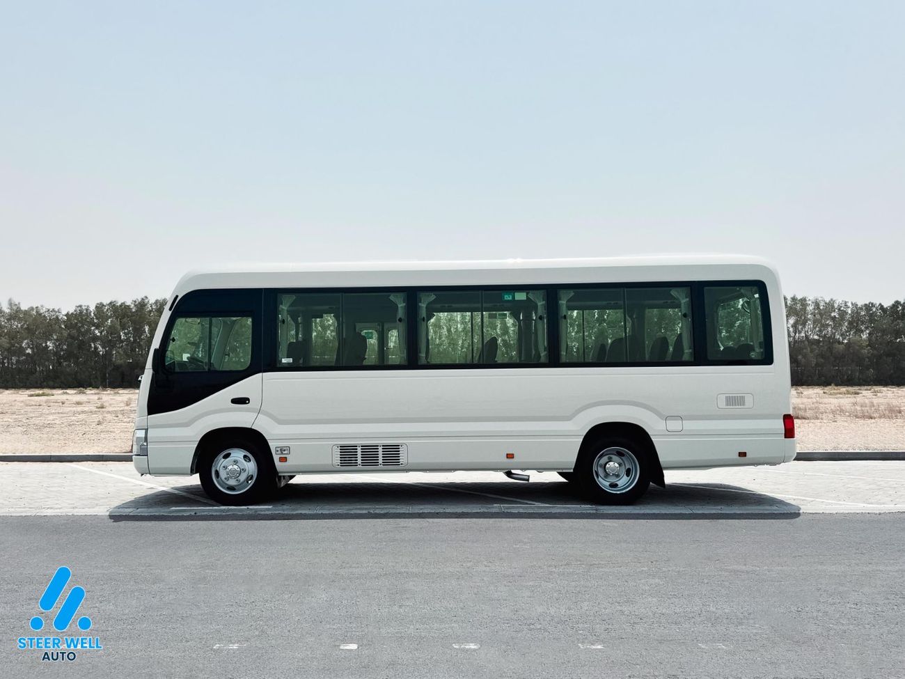 Toyota Coaster 23-Seater Bus 4.0L Diesel RWD GCC Specs Full Option White