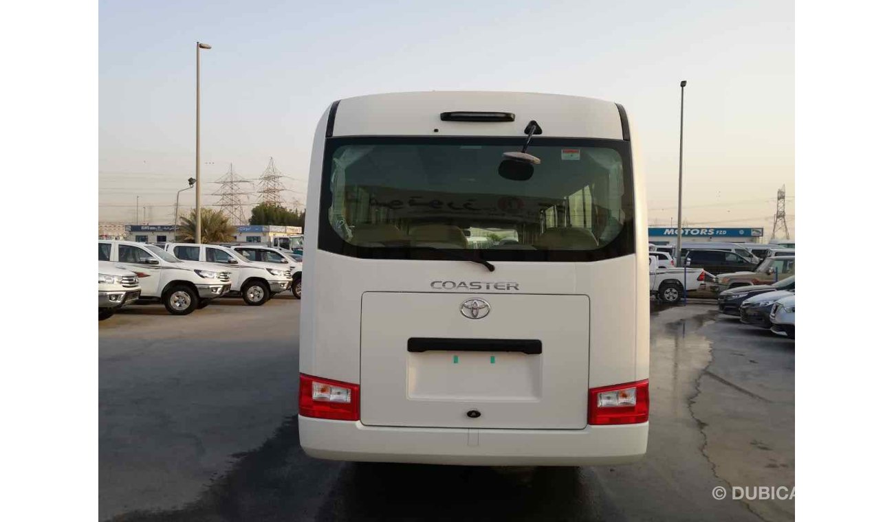 Toyota Coaster 23 seats High Roof Diesel full Option