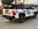 تويوتا هيلوكس TOYOTA HILUX PICK UP SR5 GR SEATS 2024 WHITE 4WD AT DIESEL = RIGHT HAND