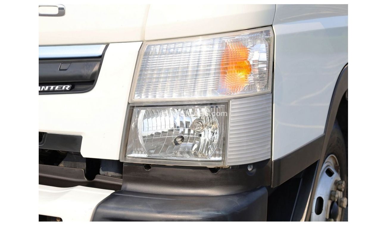 Mitsubishi Fuso Canter | Long Chassis | Shutter Box Water Body | Excellent Condition | GCC