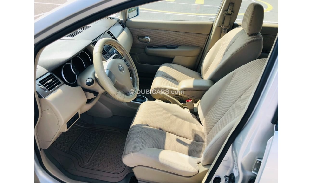 نيسان تيدا موديل 2012 خليجي فل مواصفات فتحه سقف مالك واحد من الوكاله مفتاحين فل مواصفات فتحه سقف