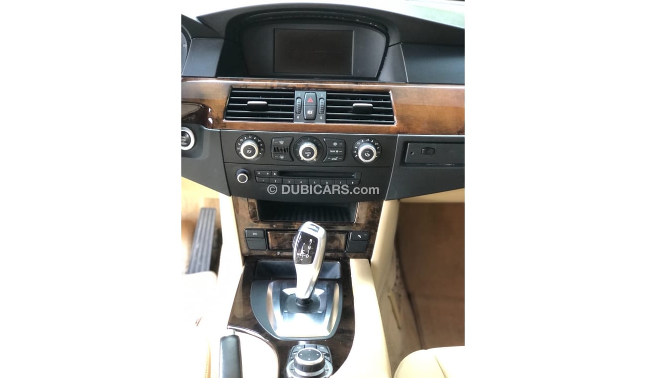 BMW 523i Model 2010 GCC car perfect condition inside and outside full option sun roof leather seats back came