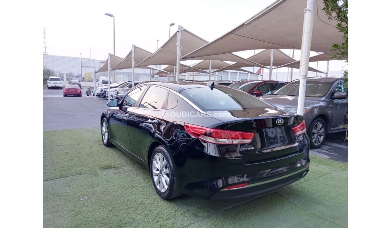 كيا أوبتيما وارد2016 رقم 2 رنجات  حساسات رنجات ومثبت سرعه وكاميرا خلفيه لاتحتاج الي مصاريف بحالة ممتازة