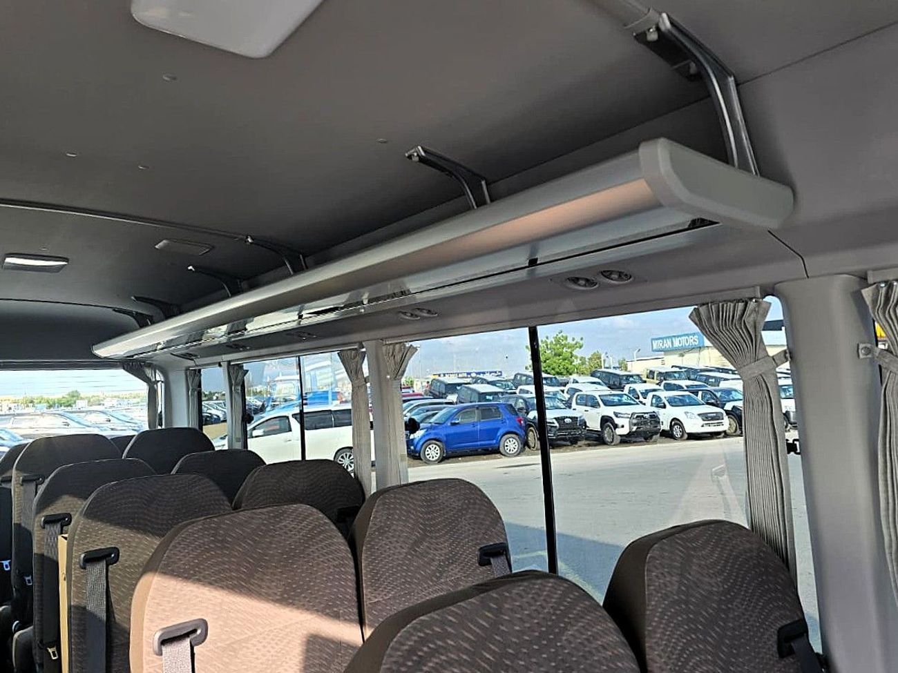 Toyota Coaster Toyota Coastor Vip 4.2l diesel M/T 22 seats with Electric Door and Cool Box White Color 2026 Model