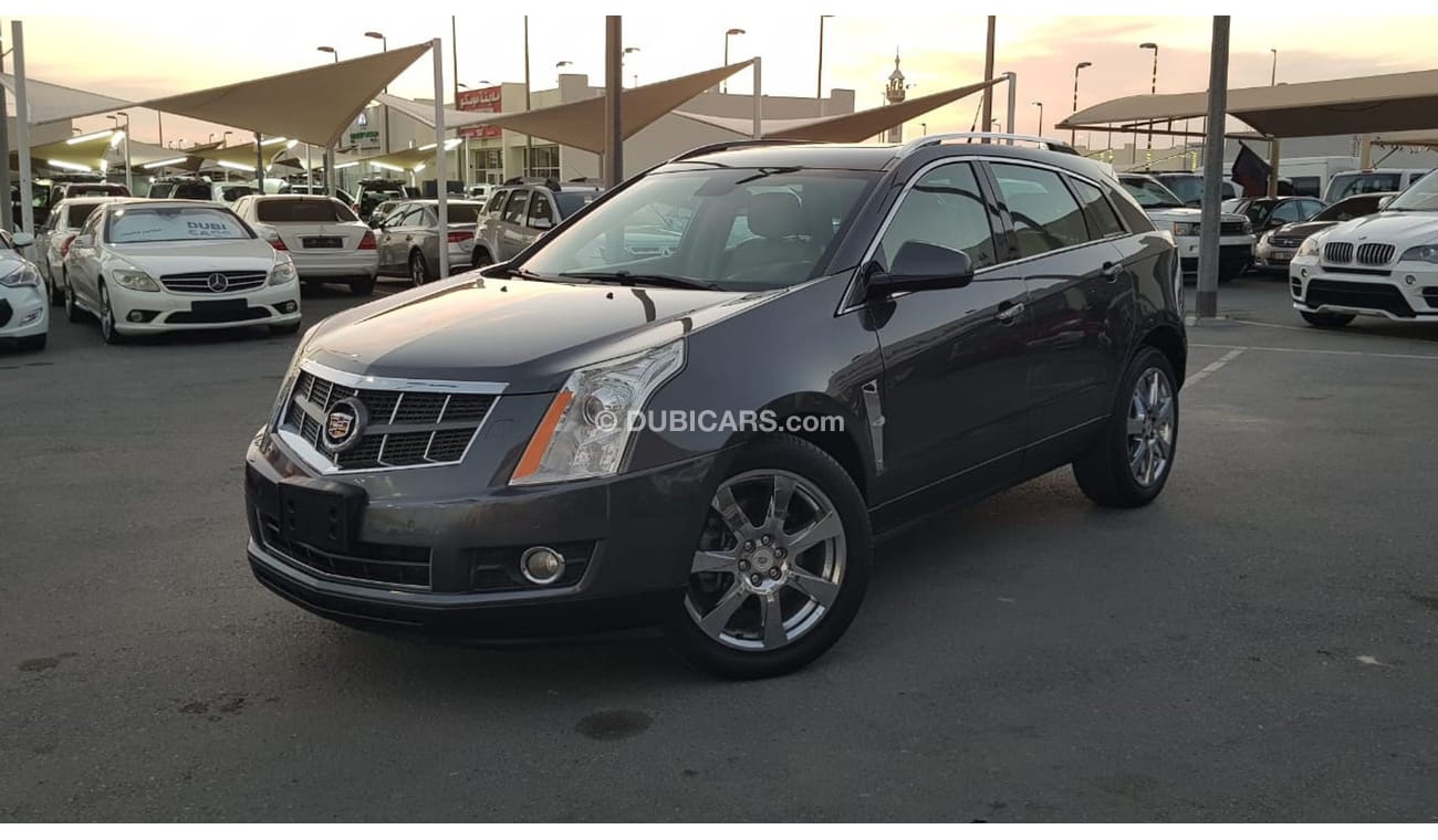 كاديلاك SRX موديل 2011 خليجي فل مواصفات كراسي جلد ومثبت سرعه وتحكم كهربي كامل ونظام صوت ممتاز وكاميرا خلفيه ومدخ
