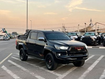Toyota Hilux SGLX 2021 Toyota Hilux Black Edition - Trunk Cover - 2.7L V4 - GCC - AWD 4x4 - Rear Camera - Le