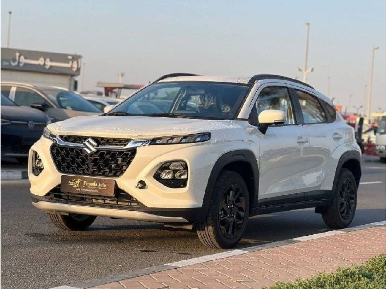 سوزوكي فرونكس GL 1.5L HYBRID A/T // 2024 // خيار وسط مع نظام تثبيت السرعة، كاميرا خلفية // عرض خاص // من FORMULA A