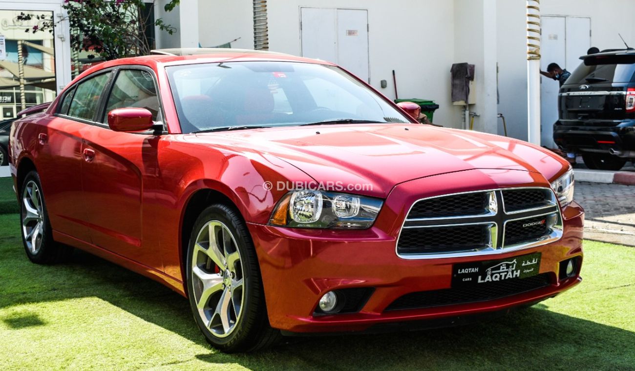 Dodge Charger Import - one number - manhole - leather - rear spoiler - cruise control - alloys - sensors in an abs