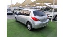 Nissan Tiida 2011 Gulf silver in excellent condition