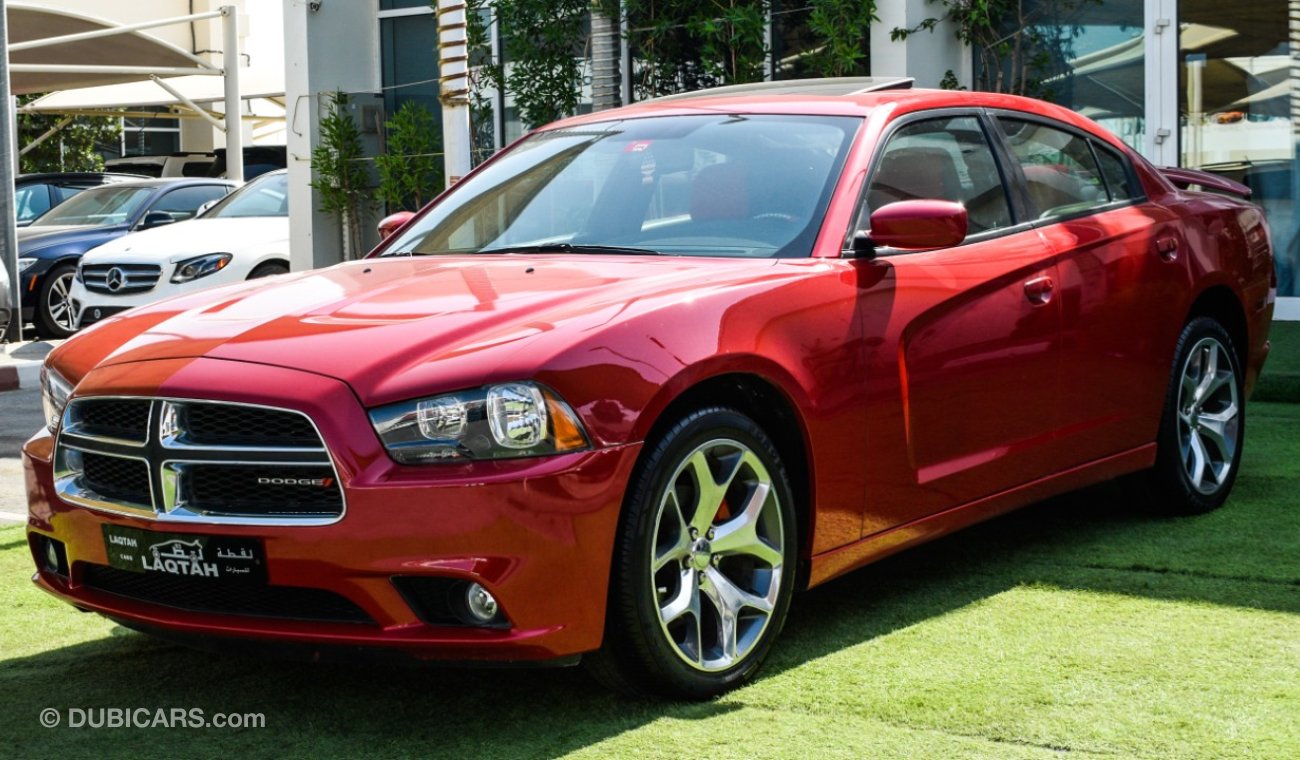 Dodge Charger Import - number one - manhole - leather - rear wing - cruise control - alloy wheels - sensors in exc