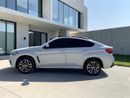 بي أم دبليو X6 AED 1,880 P.M | 0% DOWN PAYMENT | BMW X6 XDRIVE35I M KIT | AGENCY SERVICE HISTORY | 2019 | GCC SPECS
