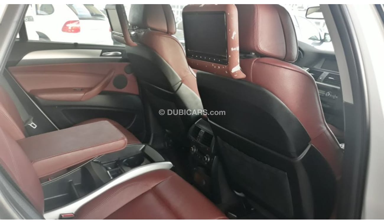 BMW X6 2010 Gulf specs  5.0 Ltr twin turbo full options 3 DVD