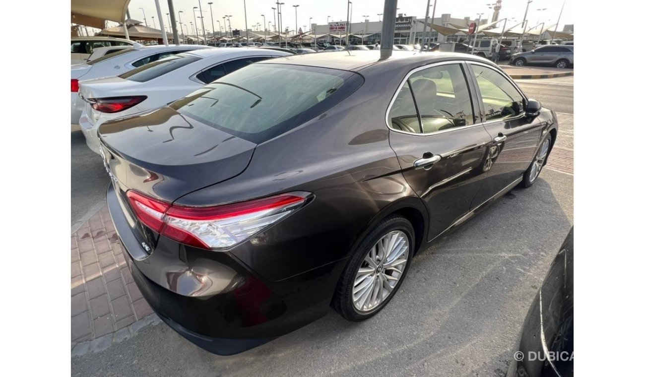 Toyota Camry 2020 GCC model, agency dye, brown color, beige interior, leather hatch, alloy wheels, mirror sensors