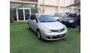 Nissan Tiida 2011 Gulf silver in excellent condition