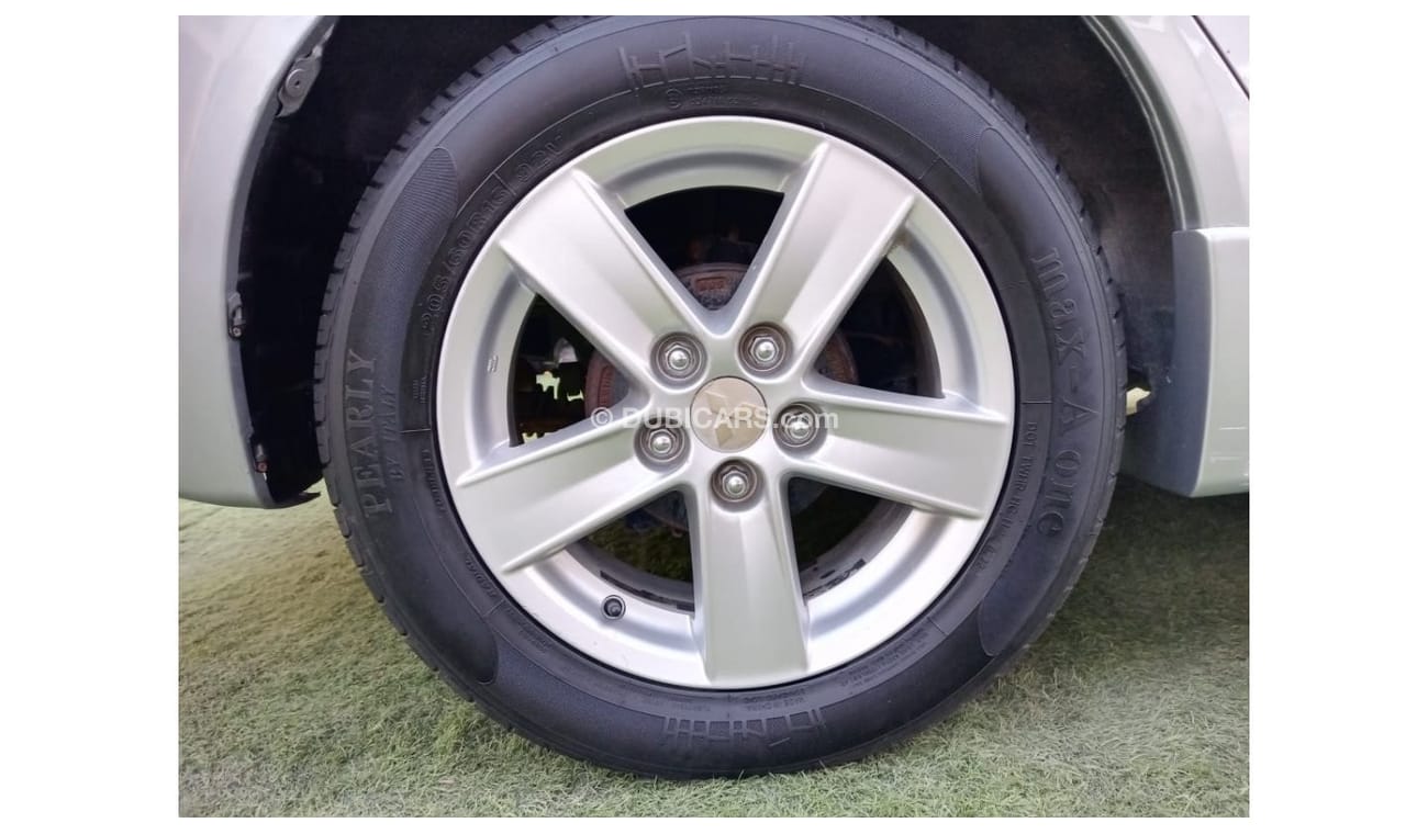 ميتسوبيشي لانسر 1600سى سى موديل 2009 خليجى فل أوبشن  خشب فتحة شاشة كاميرا خلفية بحالة ممتازة