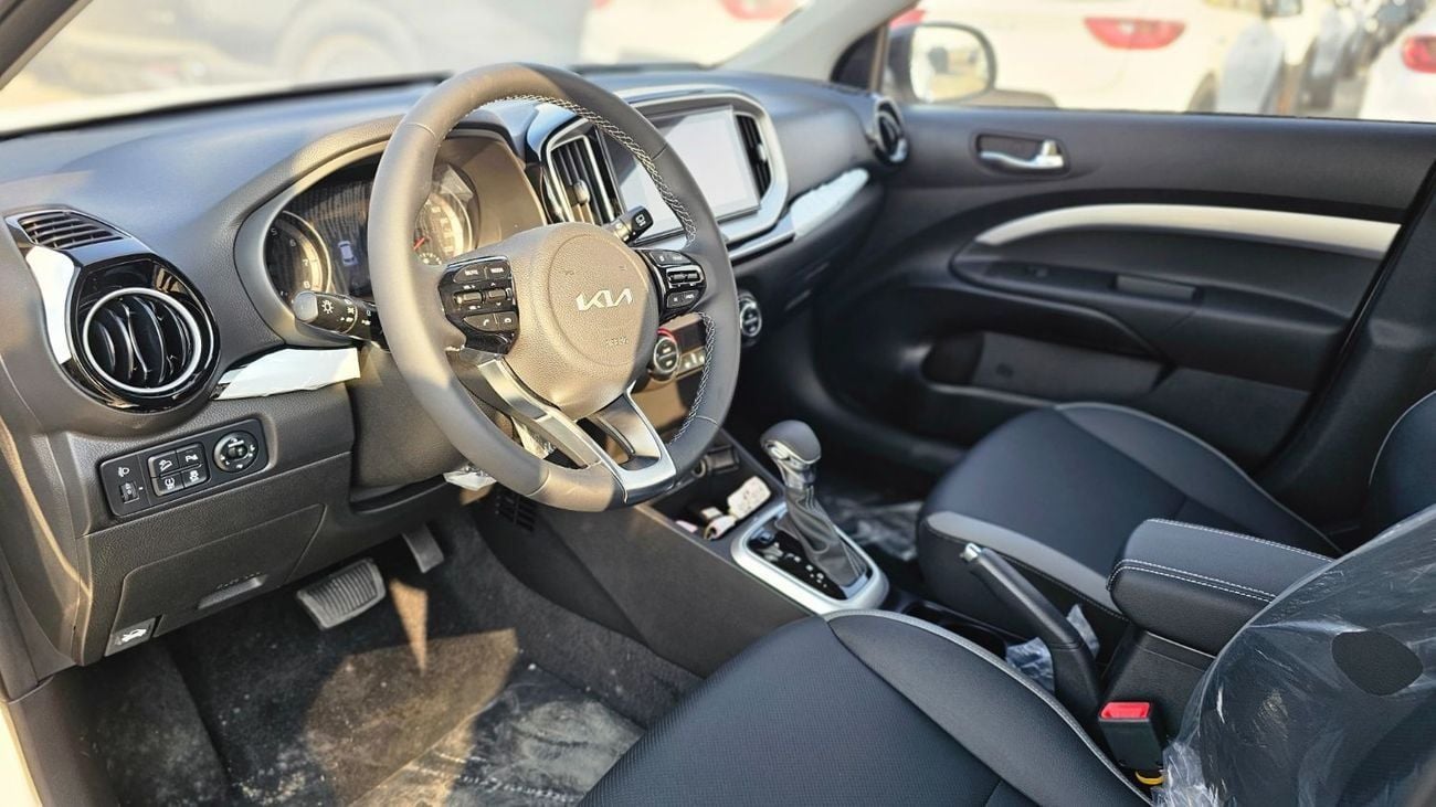 كيا KX1 Kia KX1 DUAL TONE 1.4L V4 PETROL CVT WITH SUNROOF PUSH START DVD CAMERA