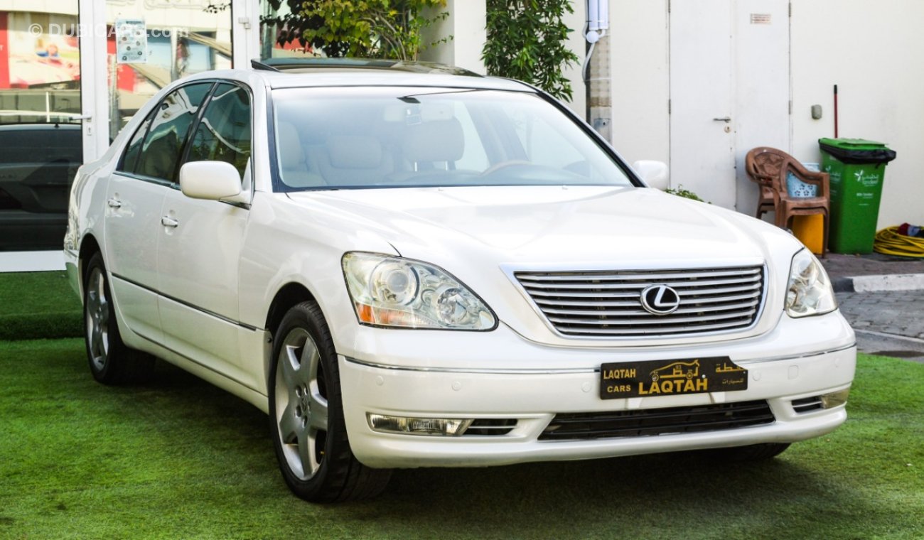 Lexus LS430 Imported 1/2 Ultra 2006 model, white color, leather opening, wooden wheels, electric mirrors, electr