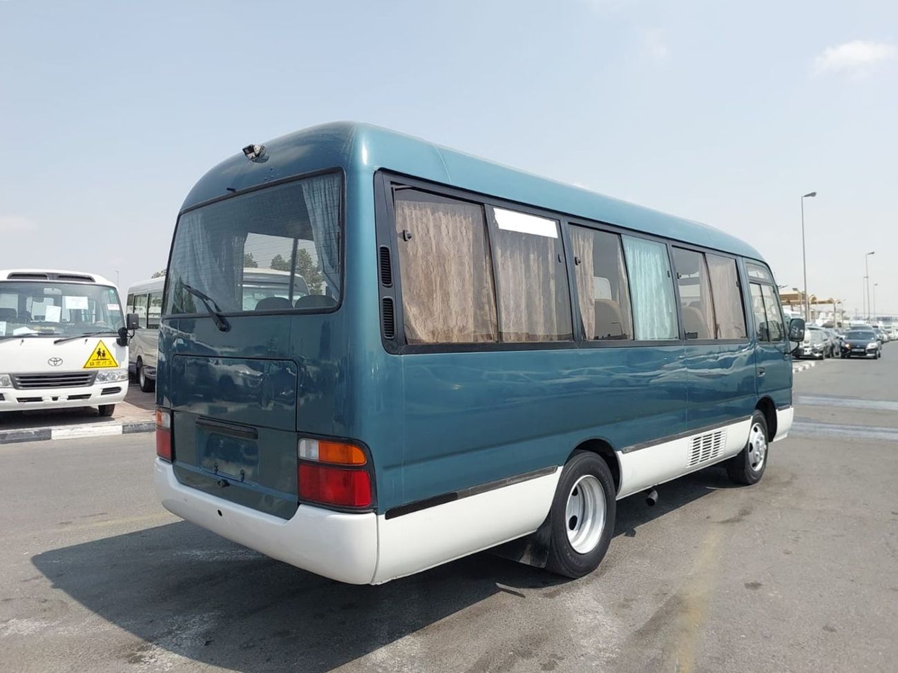 تويوتا كوستر (RAMADAN OFFER) TOYOTA COASTER BUS RHD 1996 MODEL 4.2 L DIESEL AUTOMATIC(PM01351)