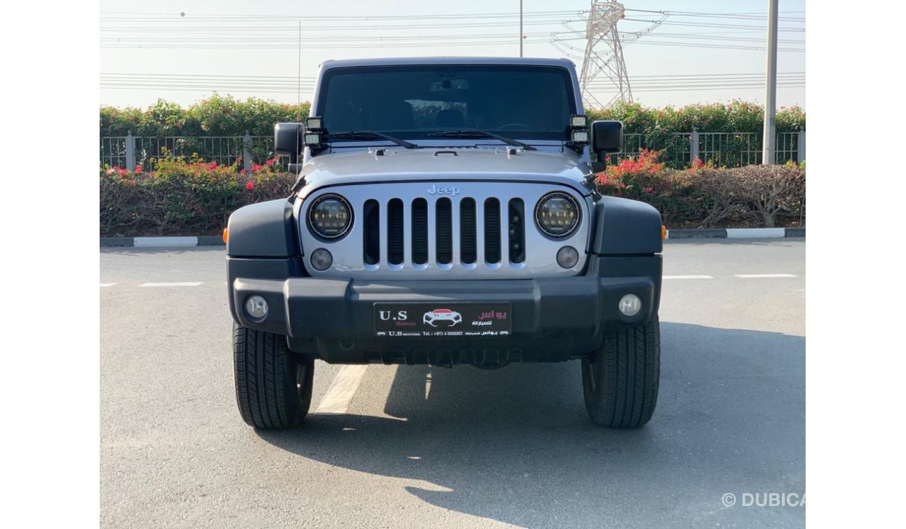 Jeep Wrangler Unlimited Sport GCC With dealership warranty