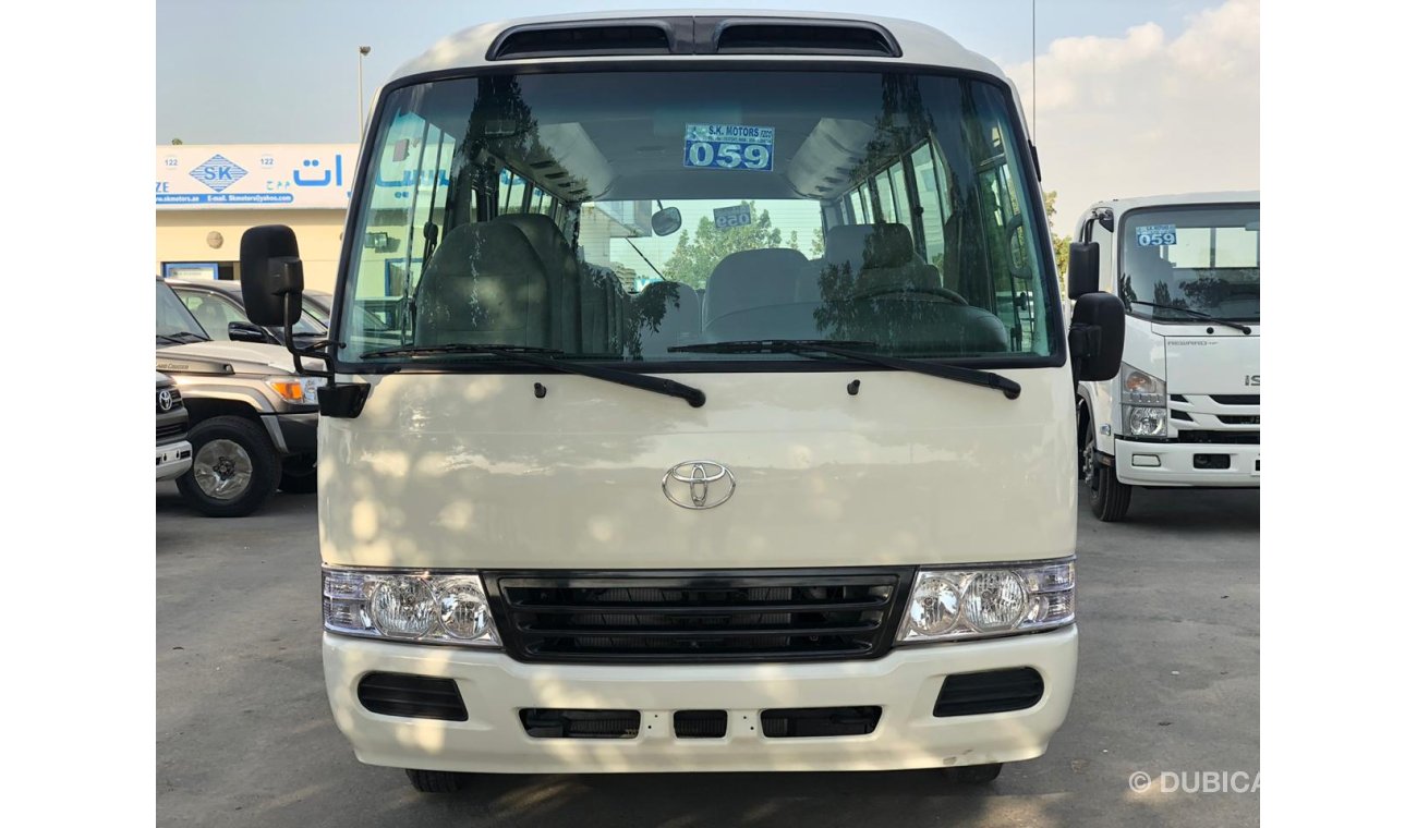 Toyota Coaster 4.2L DIESEL, Interior e Exterior Limpo, Especialmente para Angola, Grande Estoque Disponível.