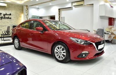 Mazda 3 EXCELLENT DEAL for our Mazda 3 ( 2015 Model ) in Red Color GCC Specs